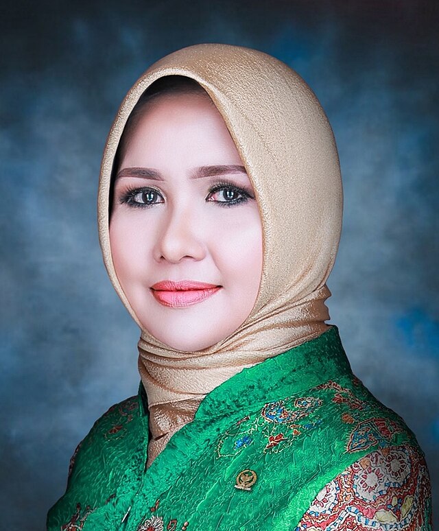 Hj. EVI APITA MAYA, SH.,M.Kn