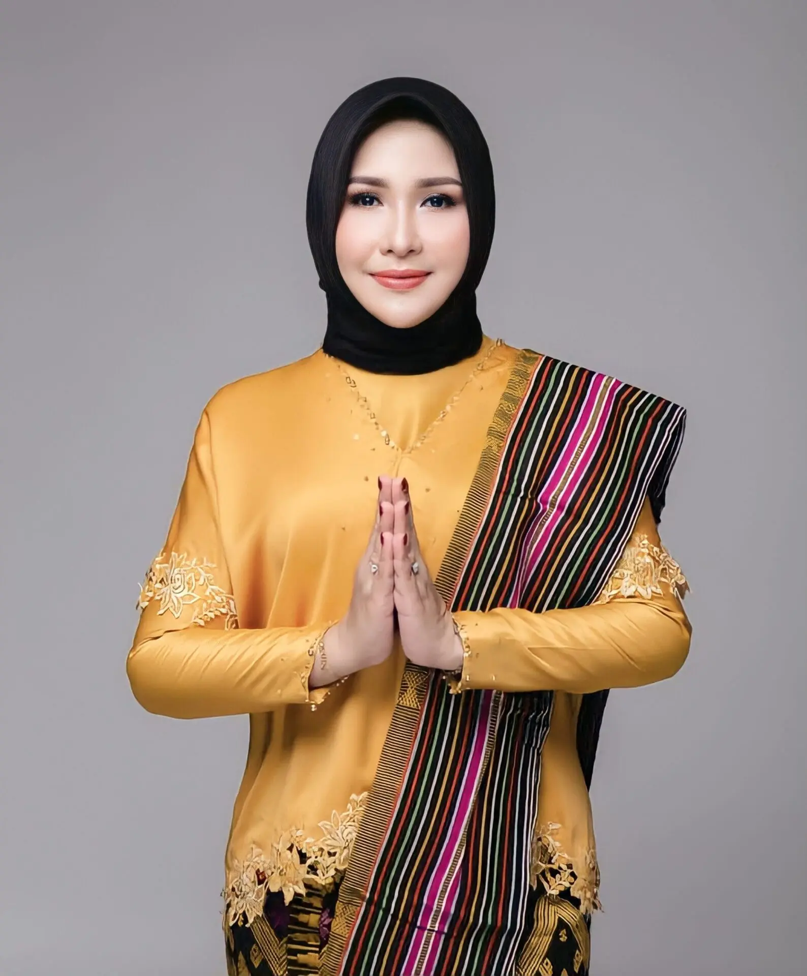 Hj. EVI APITA MAYA, SH.,M.Kn